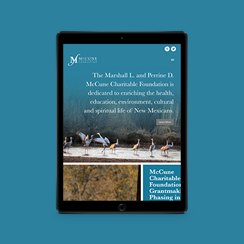 The McCune Foundation website displayed on a tablet.